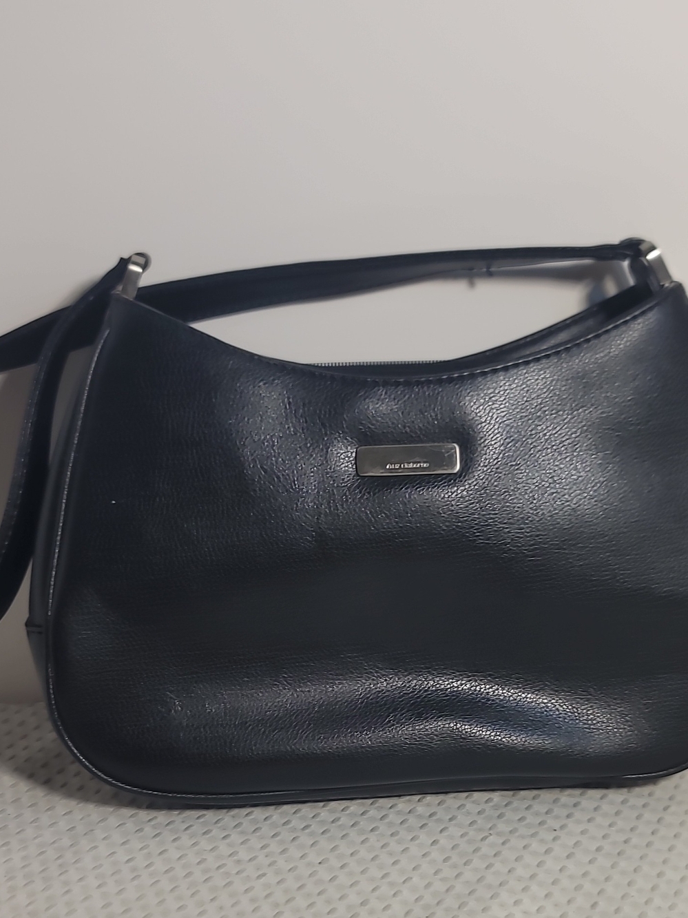 Classic Black Shoulder Bag with Subtle Logo Plate